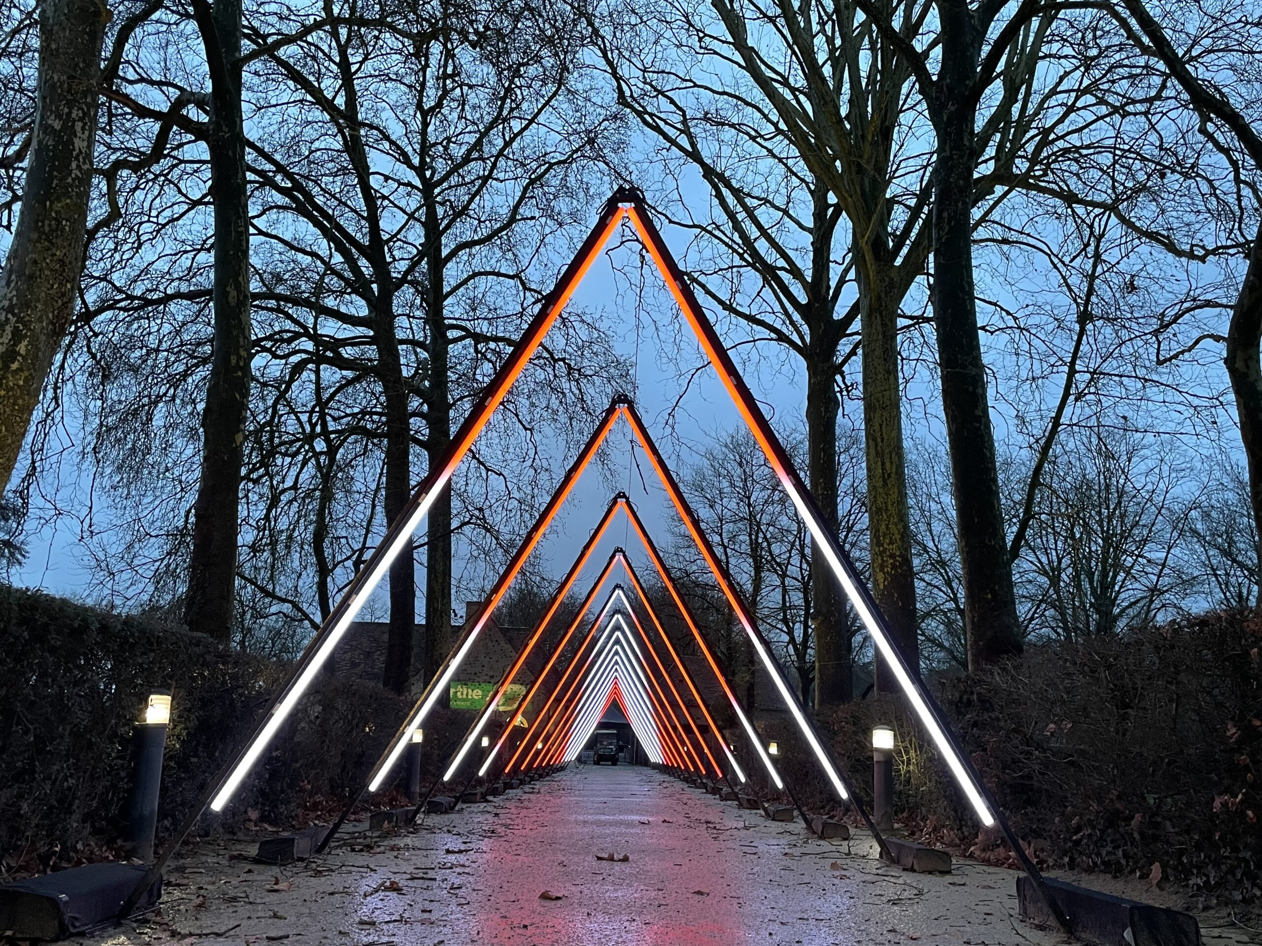 LED tube light tunnel at the Abbaye de l’Épau — photo 2