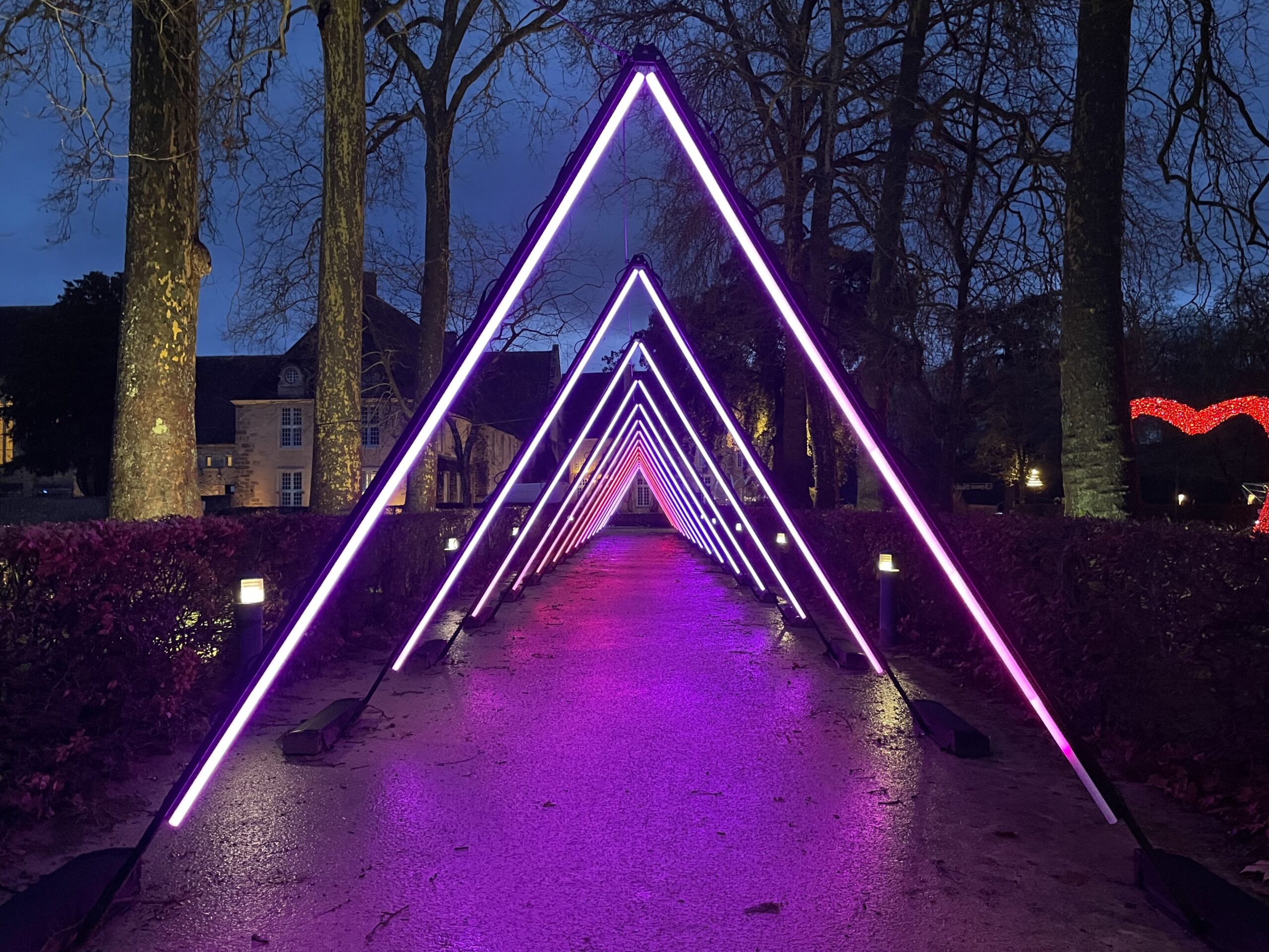 LED tube light tunnel at the Abbaye de l’Épau — photo 3