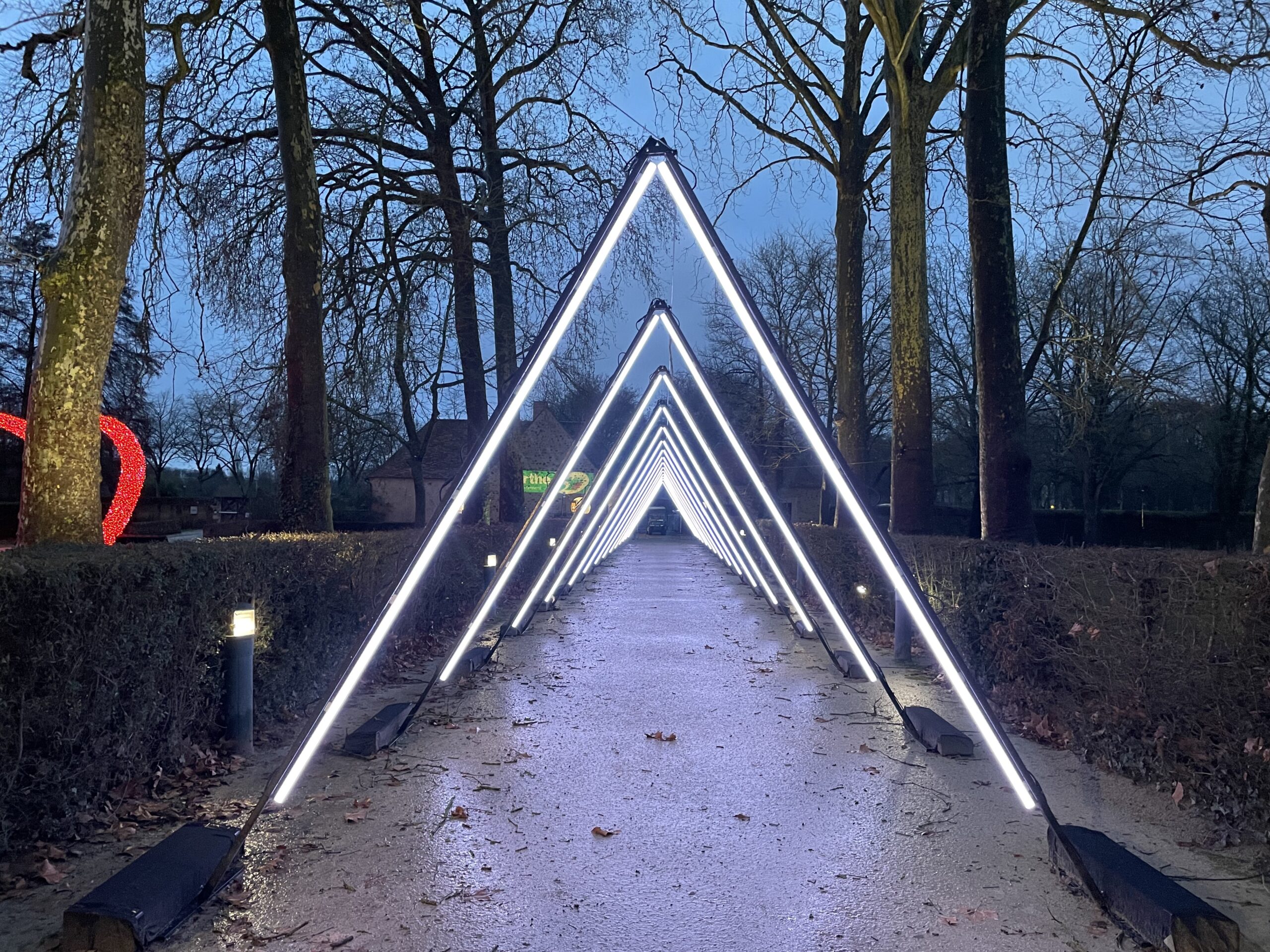 LED tube light tunnel at the Abbaye de l’Épau — photo 4